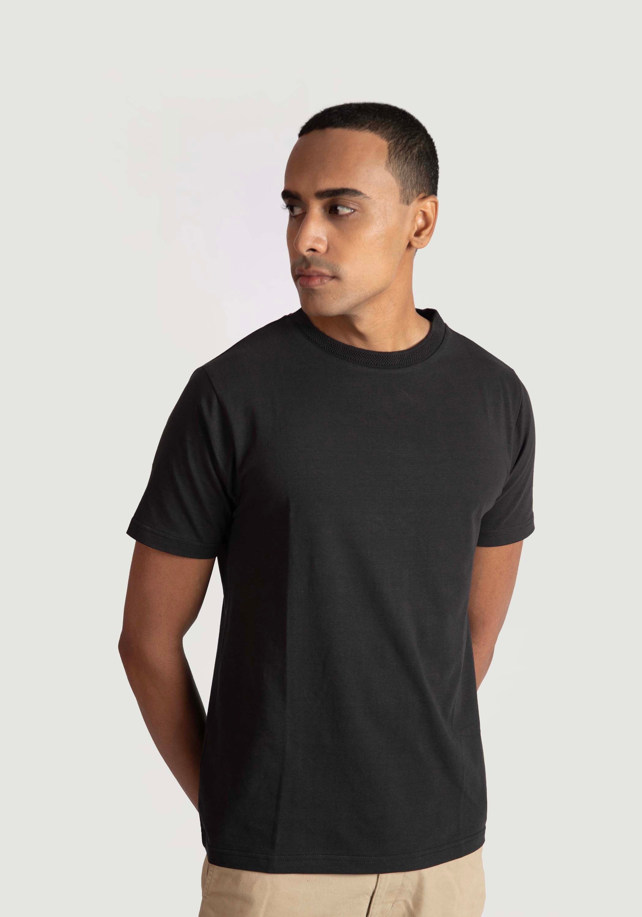 Stylera regular fit black tee for men worn by model with short sleeves and crew neck