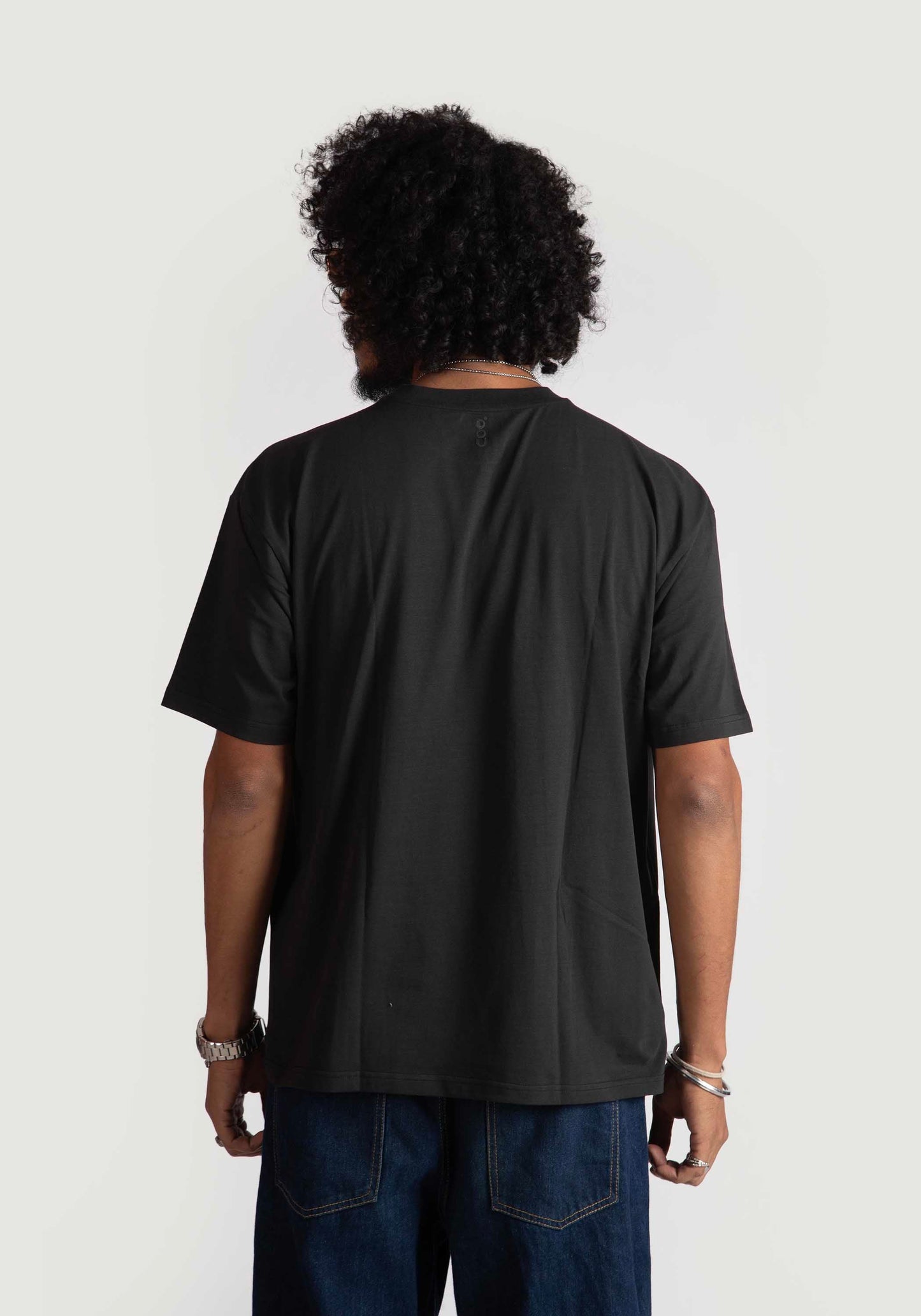 Back view of man wearing Stylera regular fit graphic motorcycle tee in black