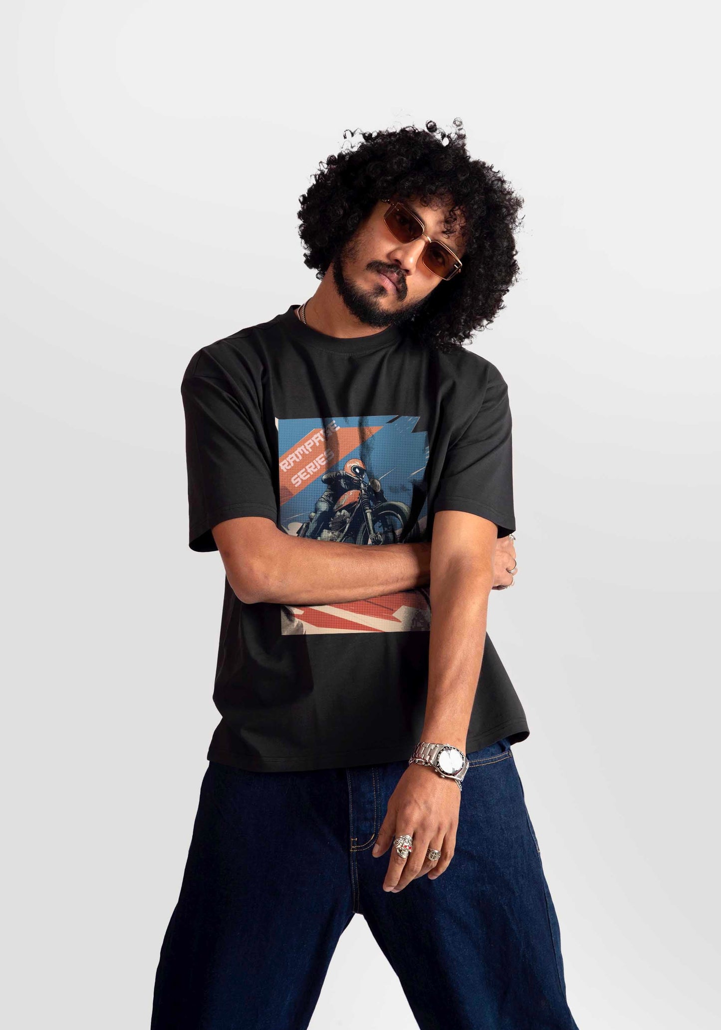 Stylera regular fit graphic motorcycle tee worn by male model with sunglasses and dark jeans