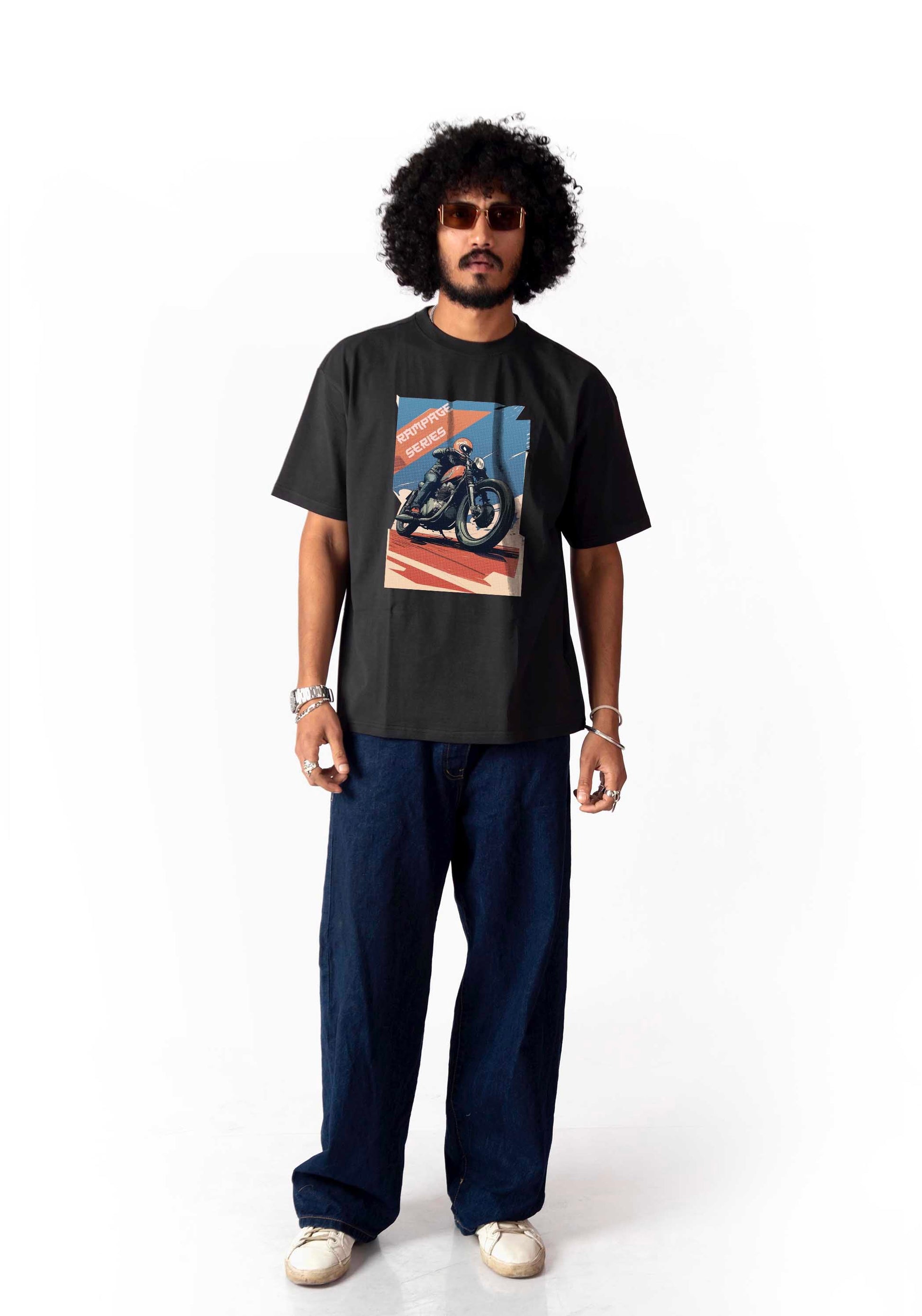 Man wearing Stylera regular fit graphic motorcycle tee with blue pants and sunglasses