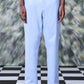 Light blue regular fit men's pants by Stylera styled with black sandals