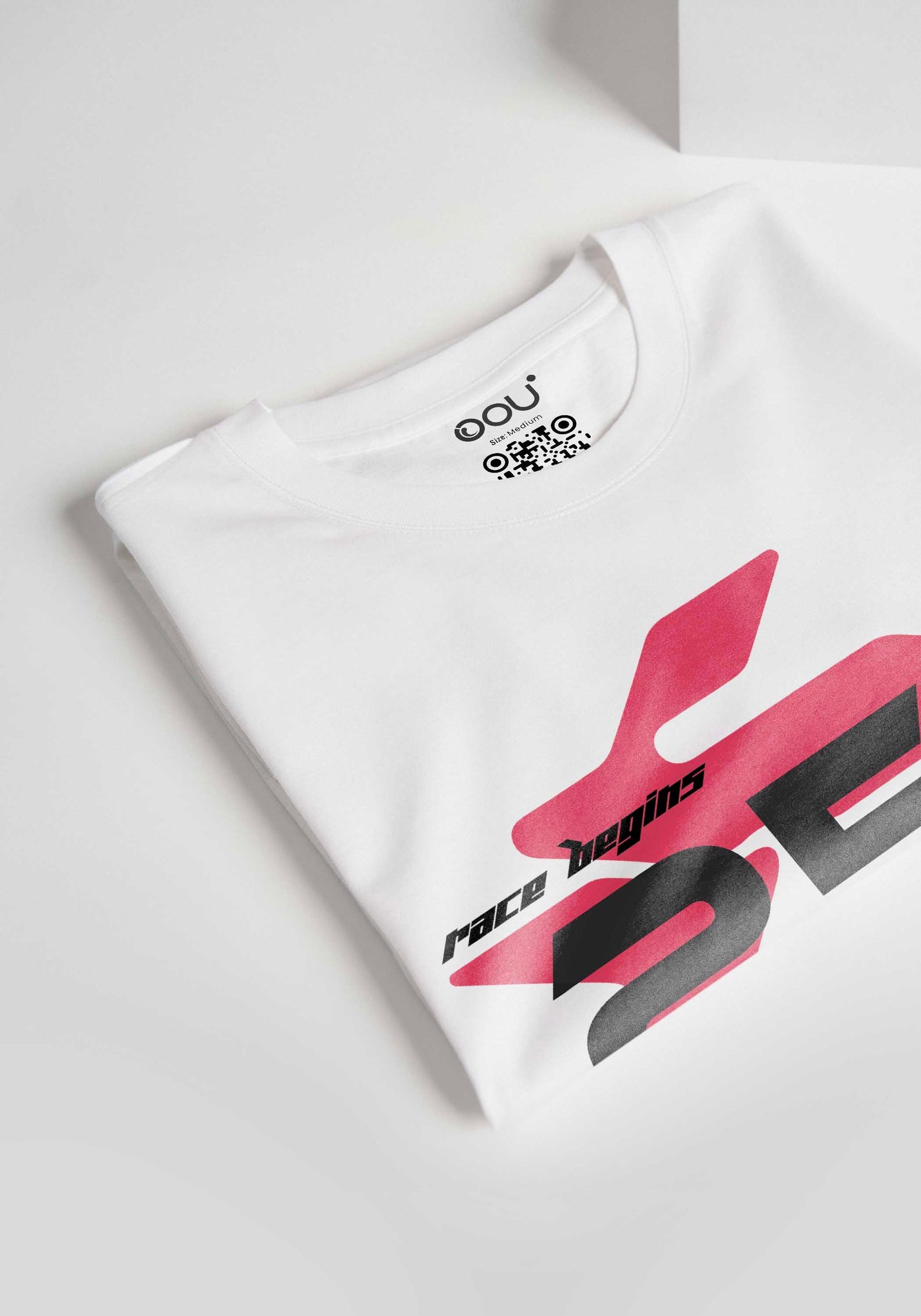 Stylera regular fit white tee with red and black graphic design folded on a white surface
