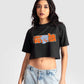 Stylera trendy black oversized crop fit t-shirt with graphic design worn with light blue jeans