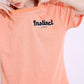 Peach Stylera oversized t shirt with embroidered logo and relaxed short sleeves on model trendy oversized casual t-shirt