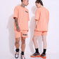 Stylera peach matching set with trendy oversized casual t-shirt on male and female models in streetwear