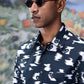 Man wearing trendy printed shirts for men with black and white abstract pattern by Stylera