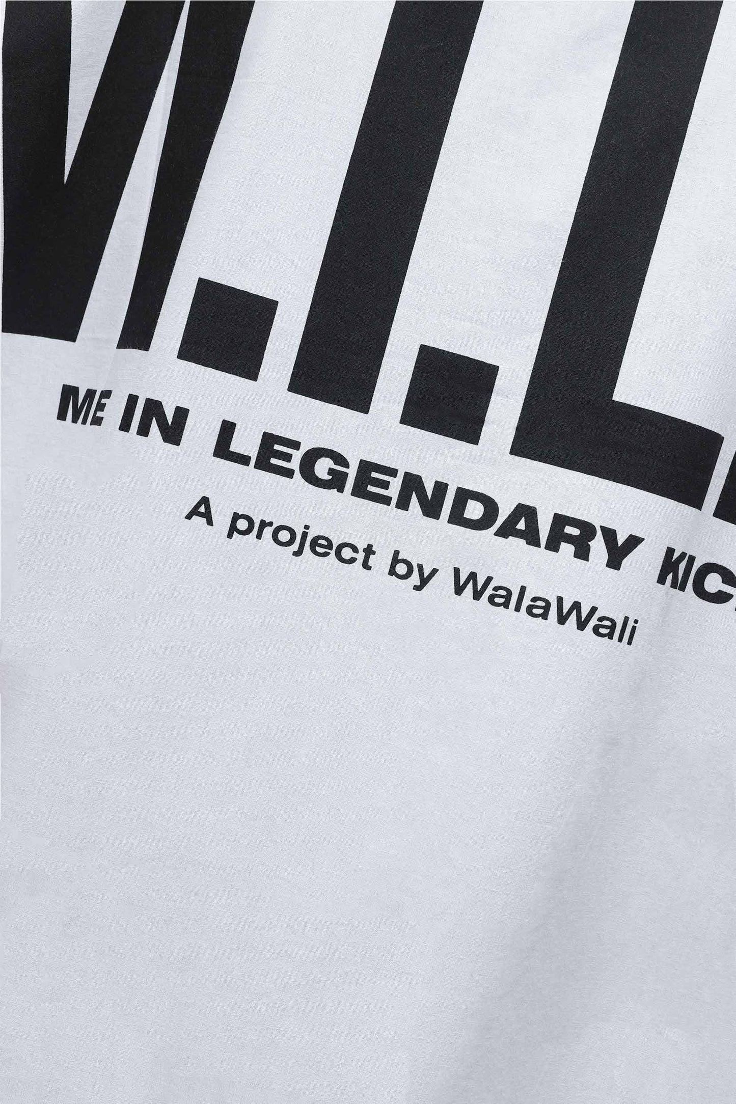 Close up of Stylera white trendy summer shirt with bold black logo print and slogan