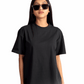 Stylera women's relaxed fit black tee modeled with sunglasses and casual blue jeans