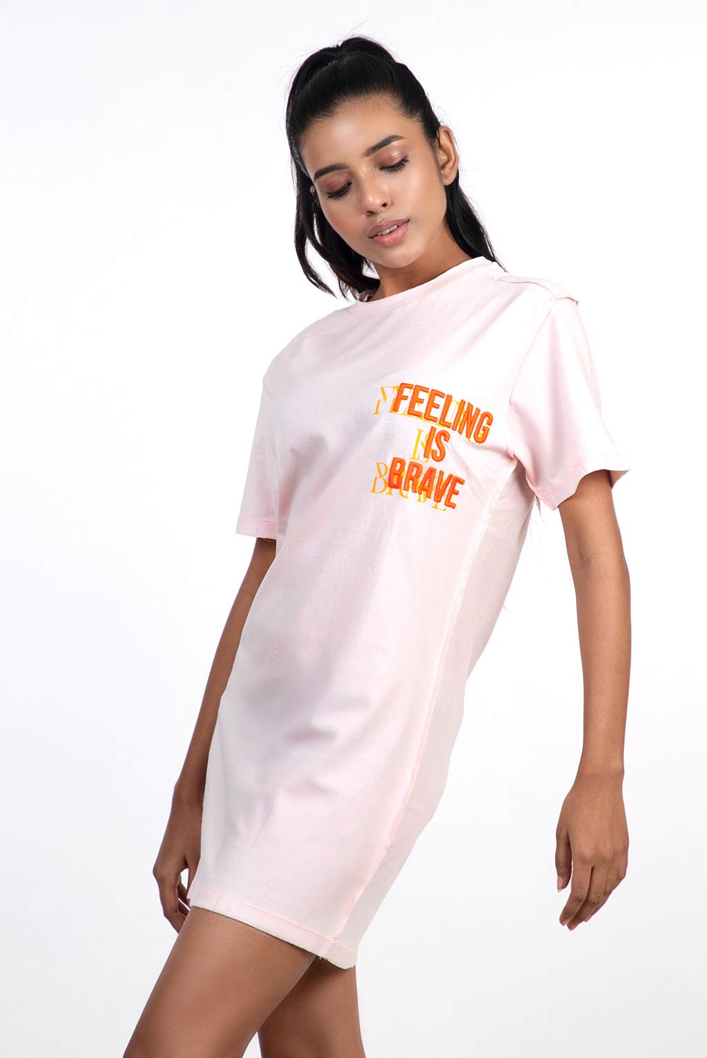 Stylera women's skinny fit top light pink tee dress with orange chest graphic worn by model