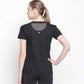 Woman with a ponytail, seen from behind with hand on hip, wearing the Tuna London Sara Basic Sports Tee With Net Detailing for Women against a white background.