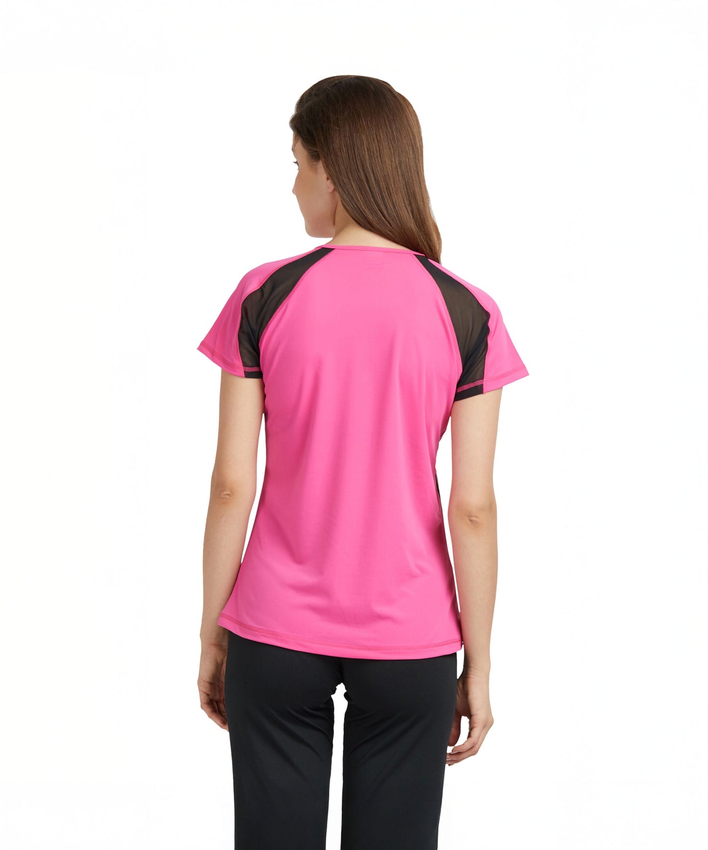 Woman wearing a Tuna London Pink Poly Blend Round Neck T-shirt and black pants, shown from the back against a white background.