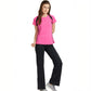 A woman poses confidently against a white background, wearing the Tuna London Pink Poly Blend Round Neck Women’s T-Shirt and black workout pants, styled for the gym.