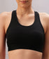 Model wears the Black Sports Bra with adjustable straps, shown from shoulders to waist against a neutral background.
