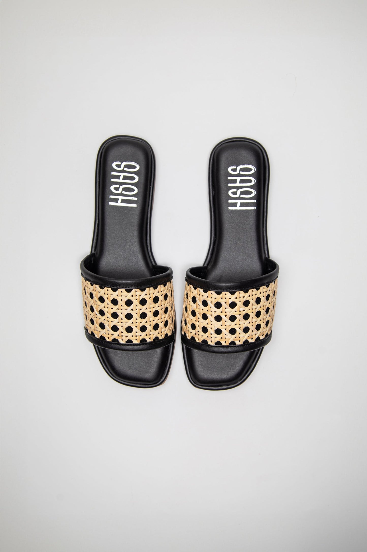 Stylera black woven sandals for women with beige braided strap and open toe design