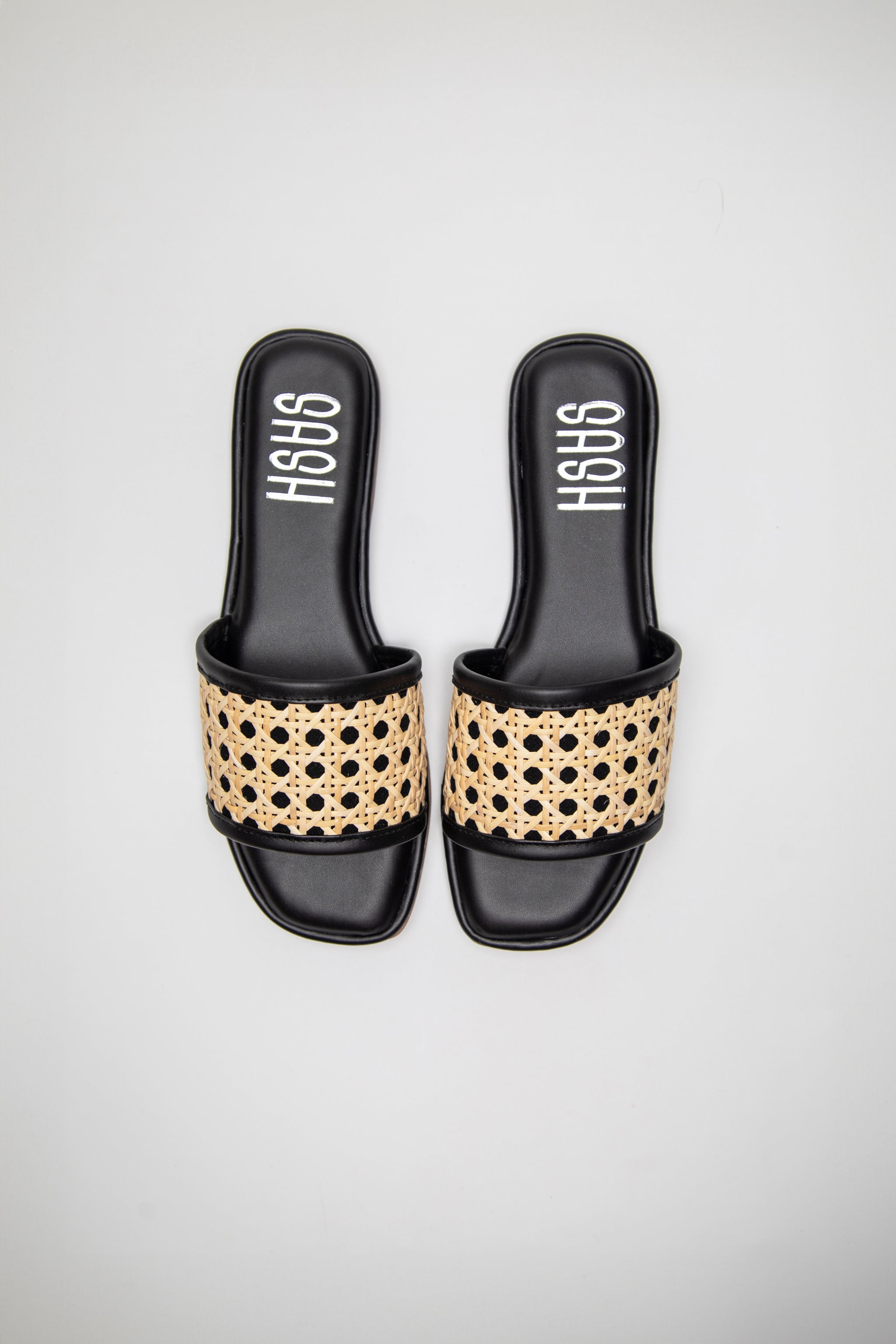 Stylera black woven sandals for women with beige braided strap and open toe design