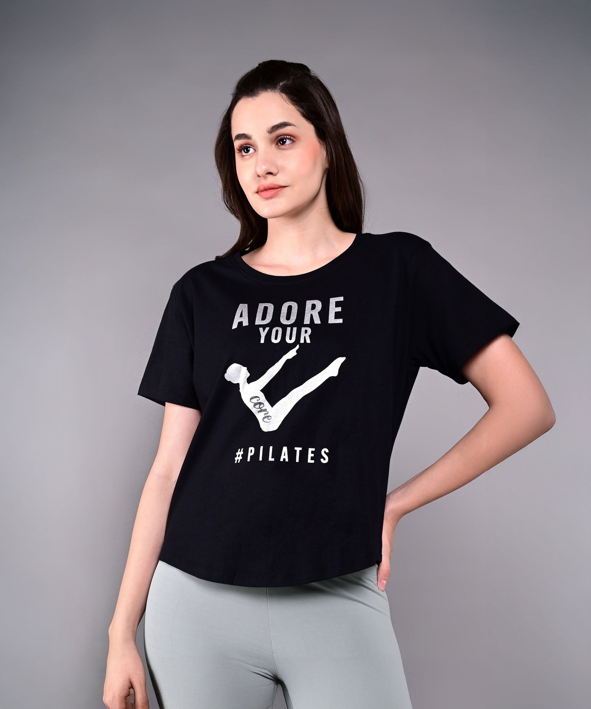 Stylera Adore Your Core printed tee in black featuring Pilates graphic for fitness enthusiasts