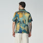 Back view of an Artisan print short sleeve shirt featuring vibrant artwork and a relaxed fit