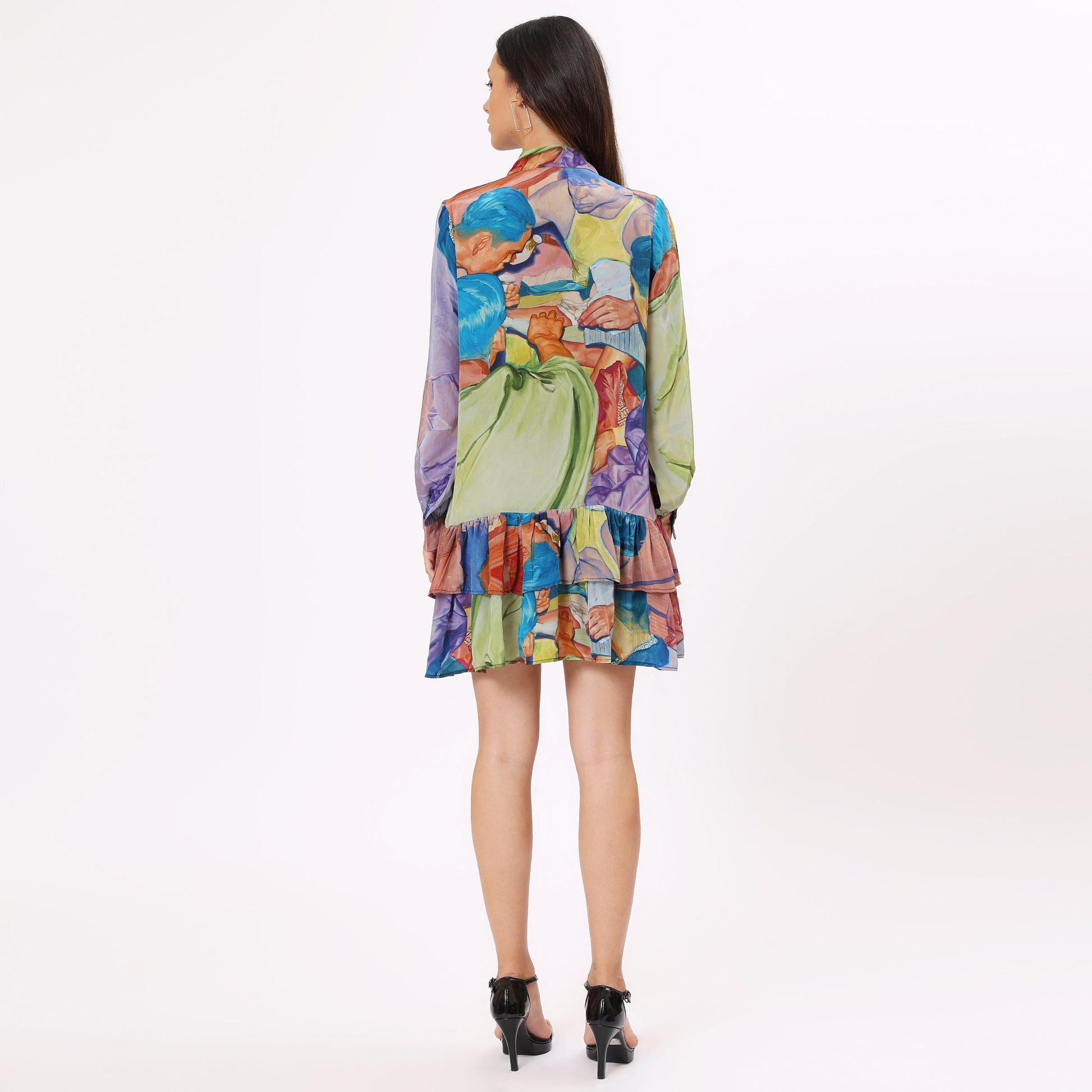 Stylera Artistic print casual dress featuring a colorful design with flared ruffles and long sleeves