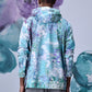 Back view of model wearing Stylera artistic print hoodie shirt in aqua purple watercolor