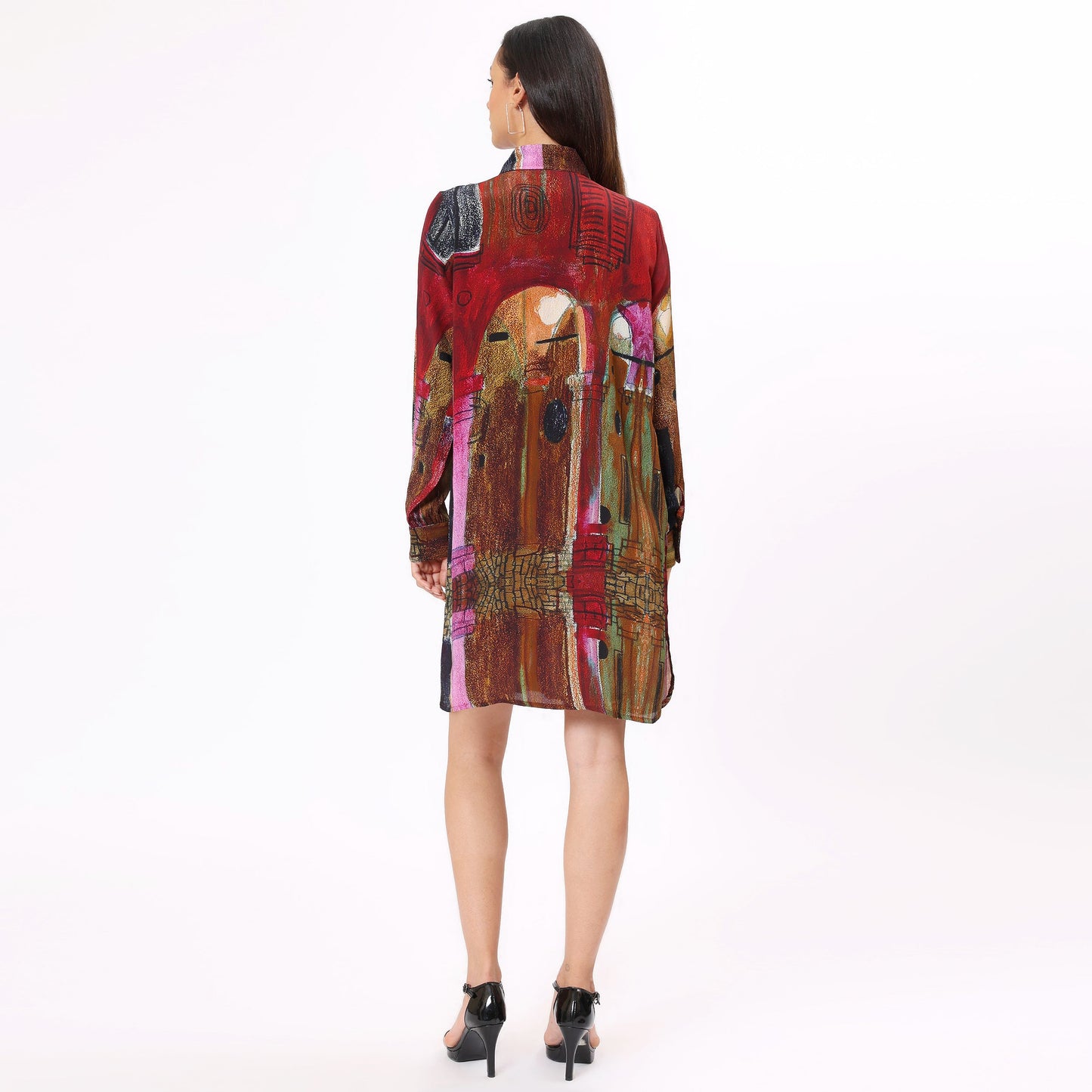 Back view of Stylera artistic print mini dress with colorful graphic design and long sleeves