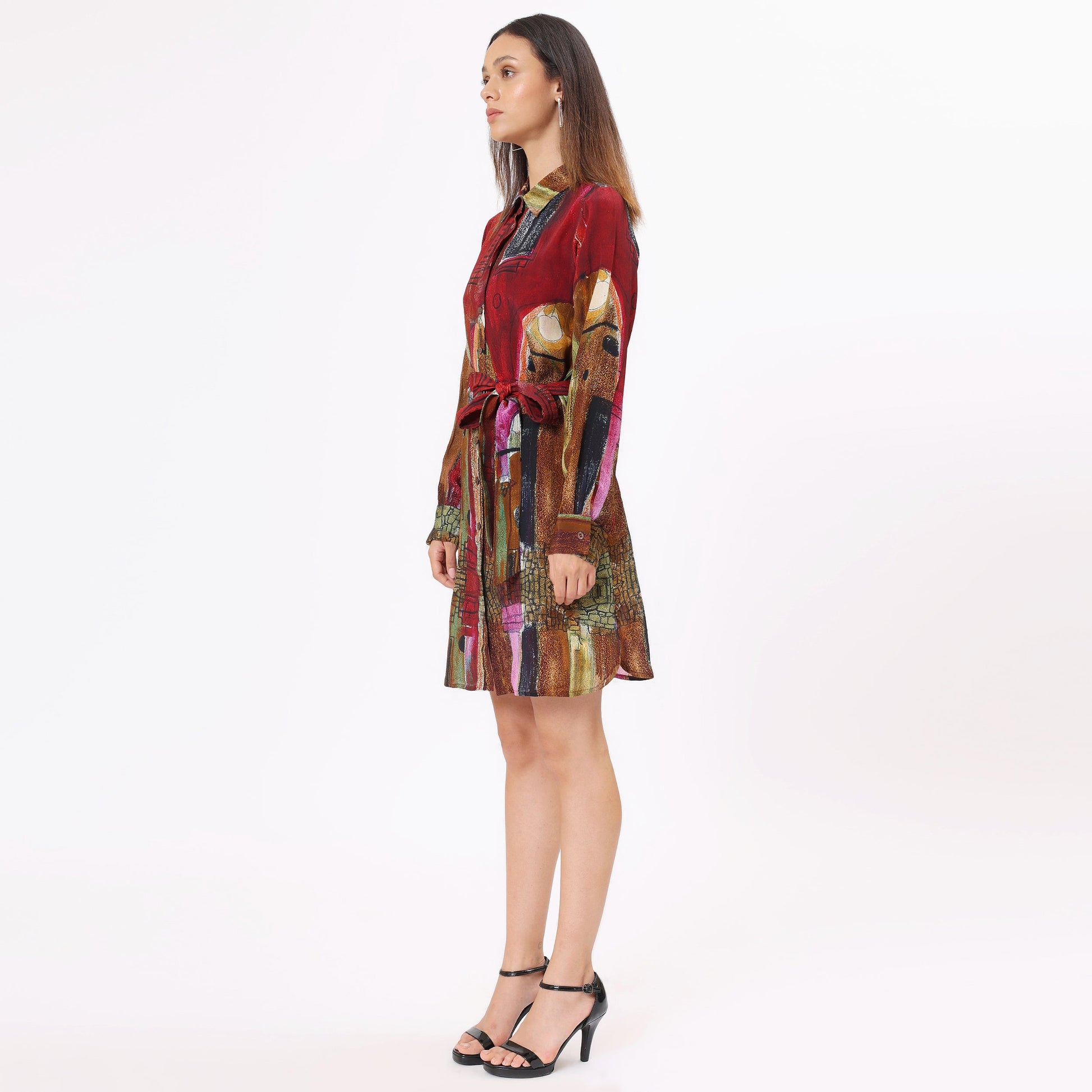 Stylera artistic print mini dress with a tie belt and vibrant colors, perfect for casual outings