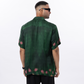 Stylera artistic print short sleeve shirt in green with floral design on the back, perfect for casual wear