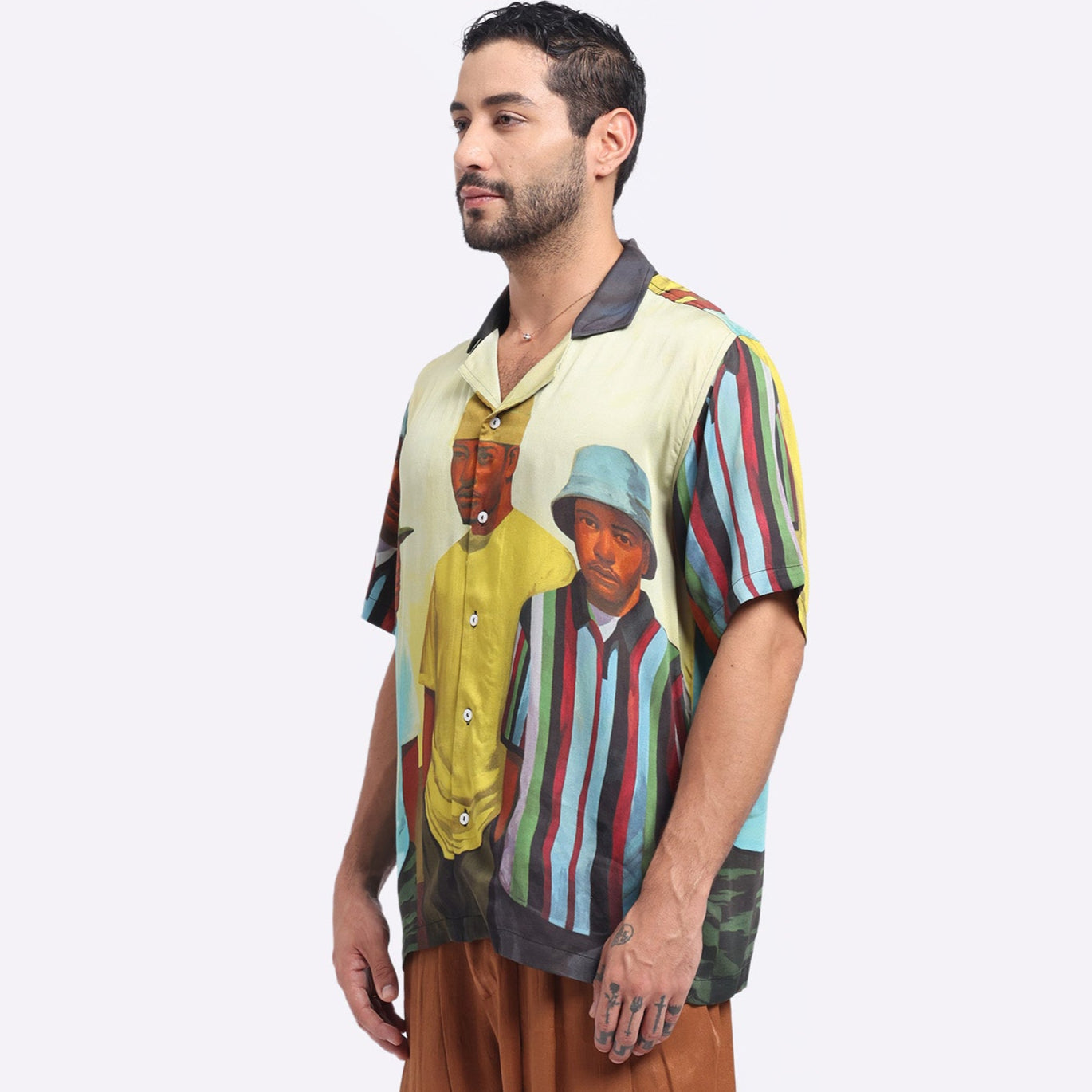 Stylera artistic printed casual shirt featuring colorful designs and a relaxed fit for stylish everyday wear