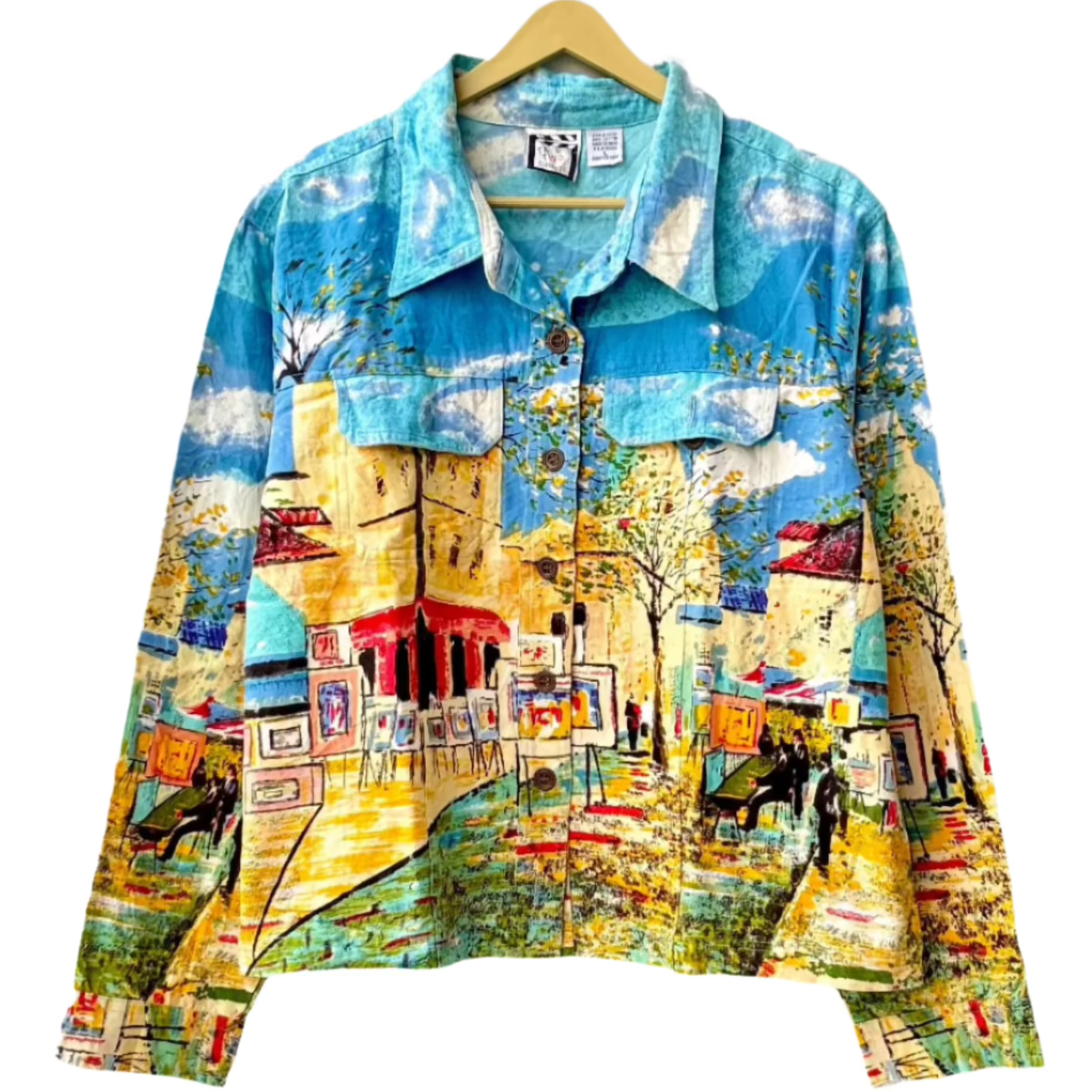 Stylera painted denim jacket outfit with hand painted village street scene in bright blues and yellows