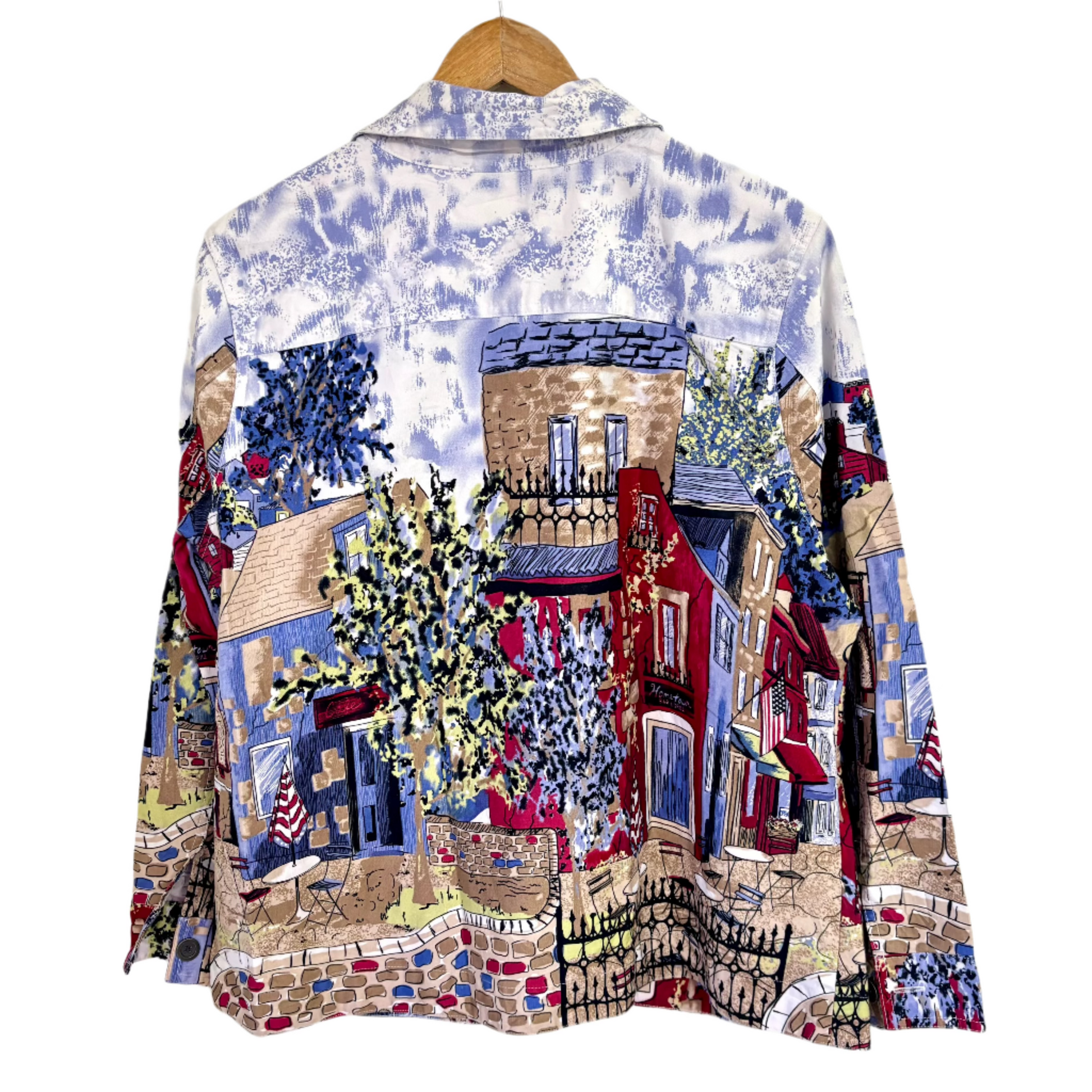 Stylera cityscape button up shirt on wooden hanger unique graphic shirts for women colorful village print