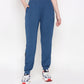 Woman wearing Atlantic blue activewear set featuring comfortable pants for workouts