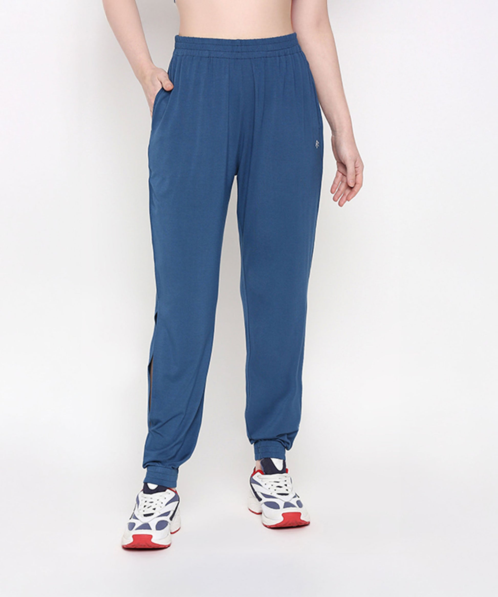 Woman wearing Atlantic blue activewear set featuring comfortable pants for workouts