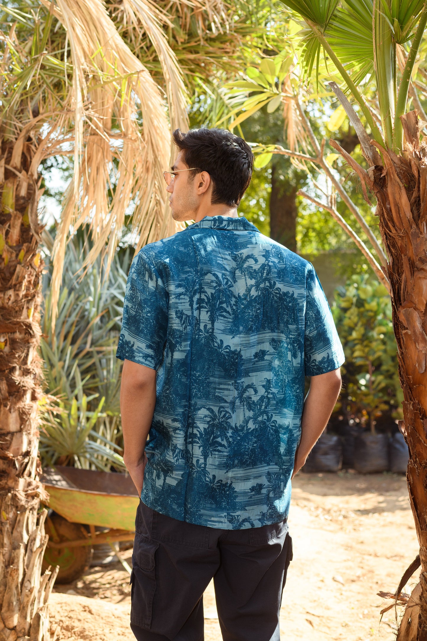Men's beach tiger print shirt for men with vibrant tropical landscape design in blue hues