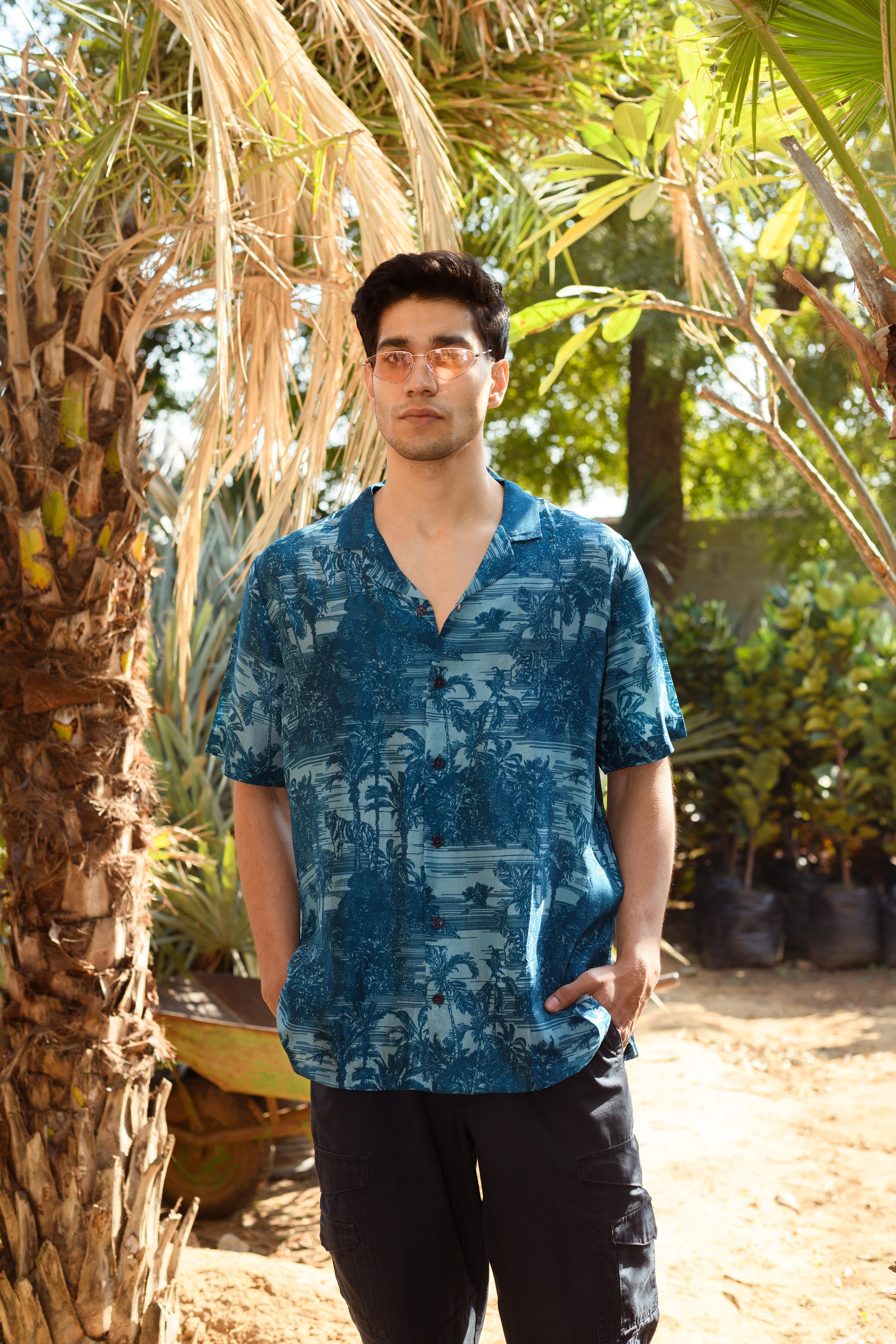 Men's beach tiger print shirt for men in blue with floral and nature-themed patterns