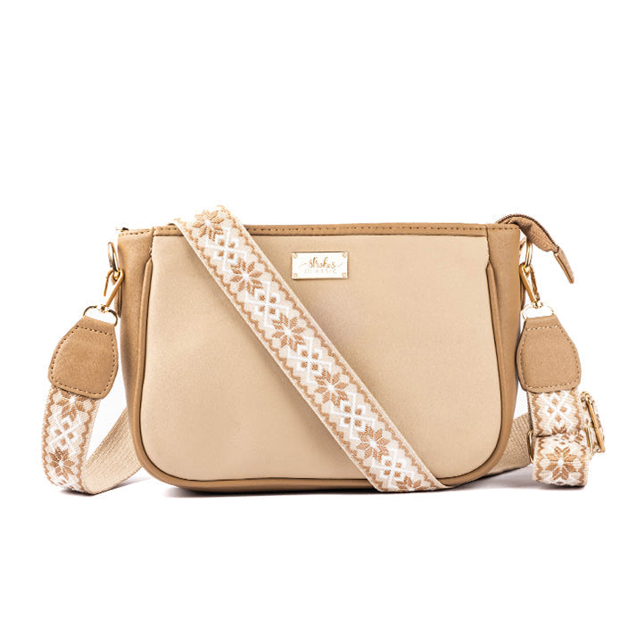 Stylera beige crossbody purse with decorative strap and stylish design