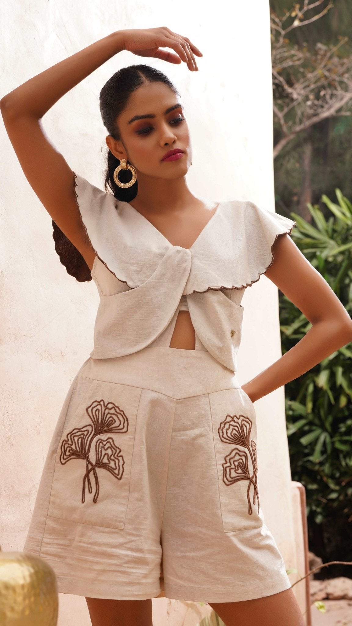 Stylera beige embroidered playsuit with large collar and floral embroidery on shorts