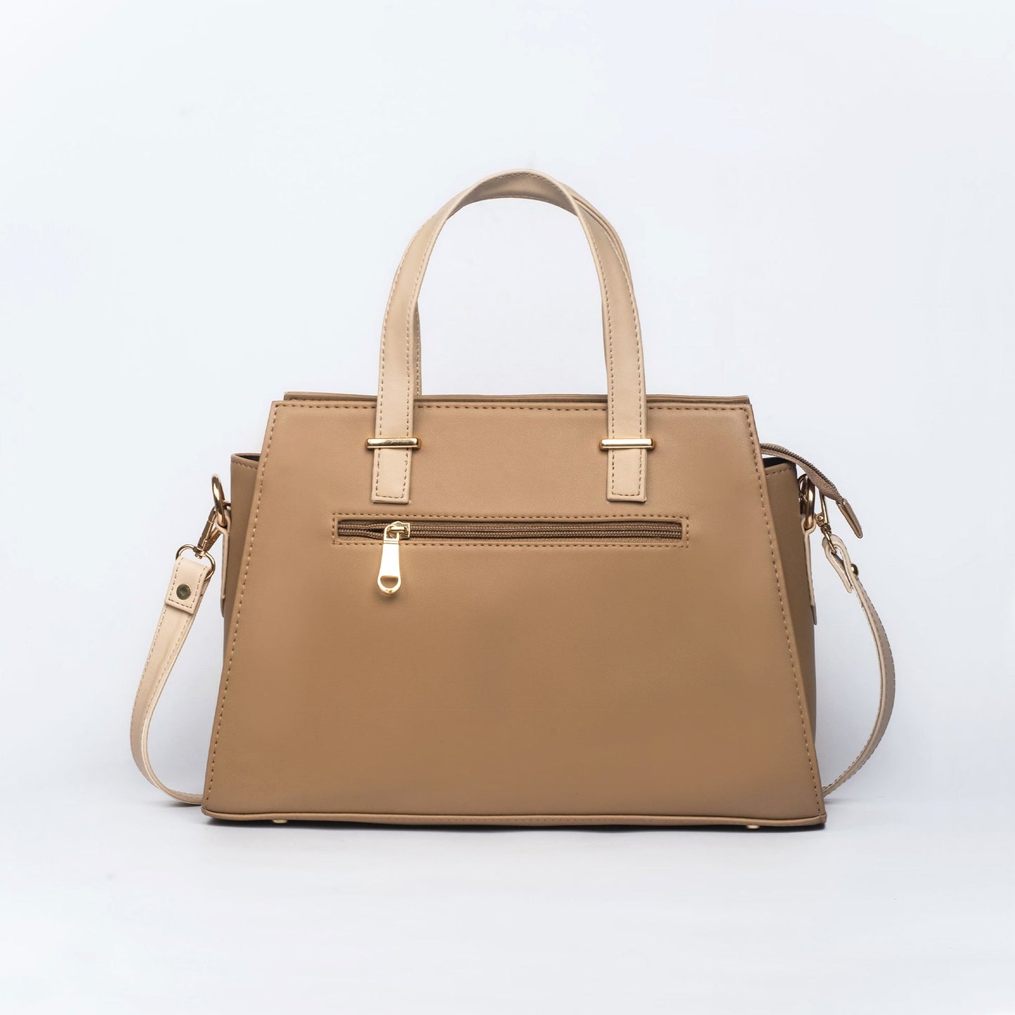 Beige luxury handbag for women by Stylera featuring sleek design and adjustable strap