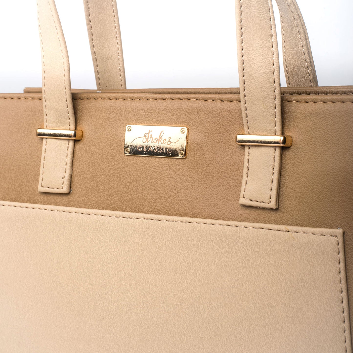 Beige luxury handbag for women by Stylera featuring elegant design and durable straps