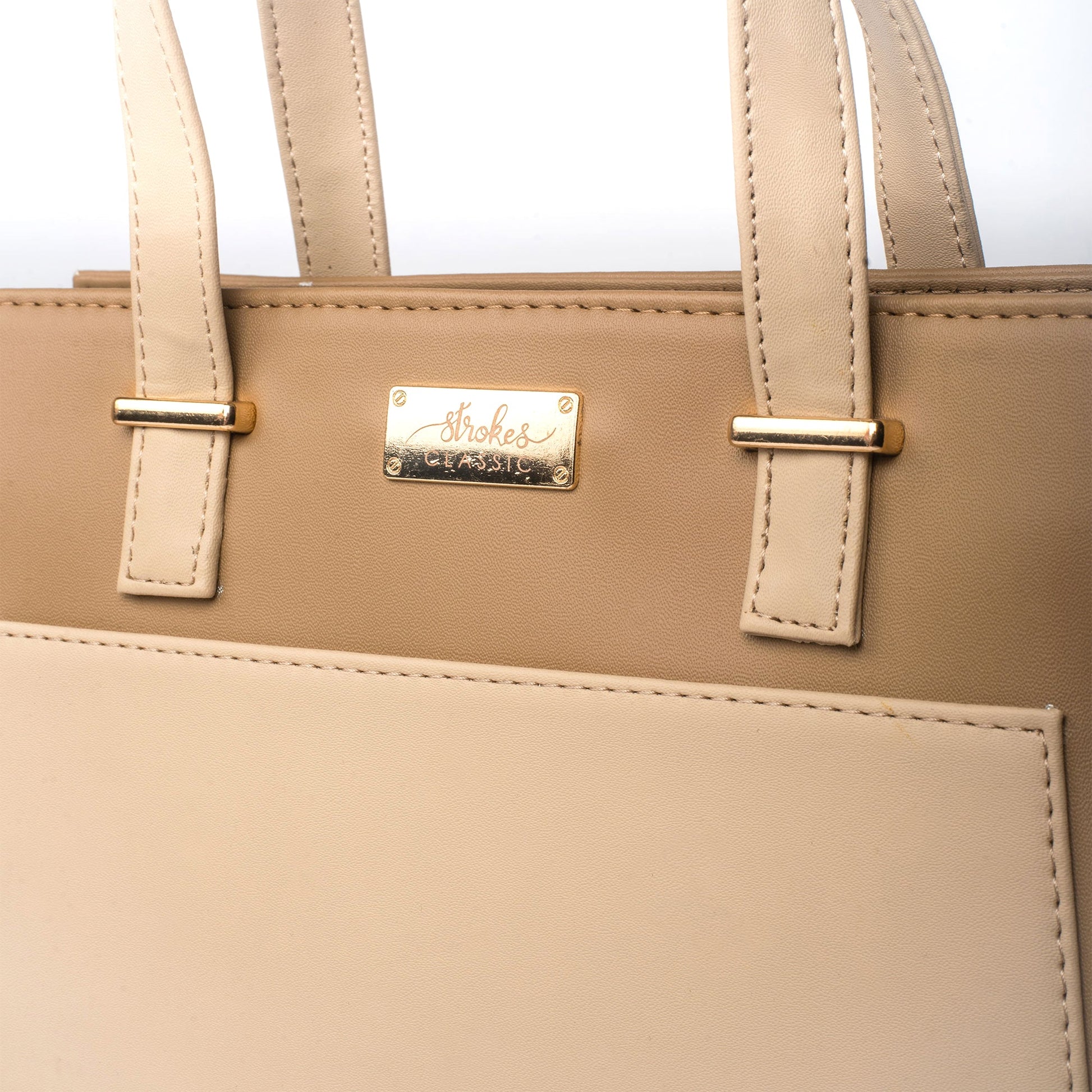 Beige luxury handbag for women by Stylera featuring elegant design and durable straps