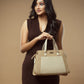 Stylish woman holding a beige luxury handbag for women with elegant design and premium materials