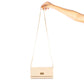 Beige wallet with chain for women, designed for style and versatility, perfect for day or night outings.