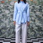 Stylera model wearing unique casual light blue shirt for women tie front long sleeves with wide leg pants