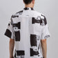 Back view of Stylera black and white artsy shirt for men short sleeve button down with brushstroke print