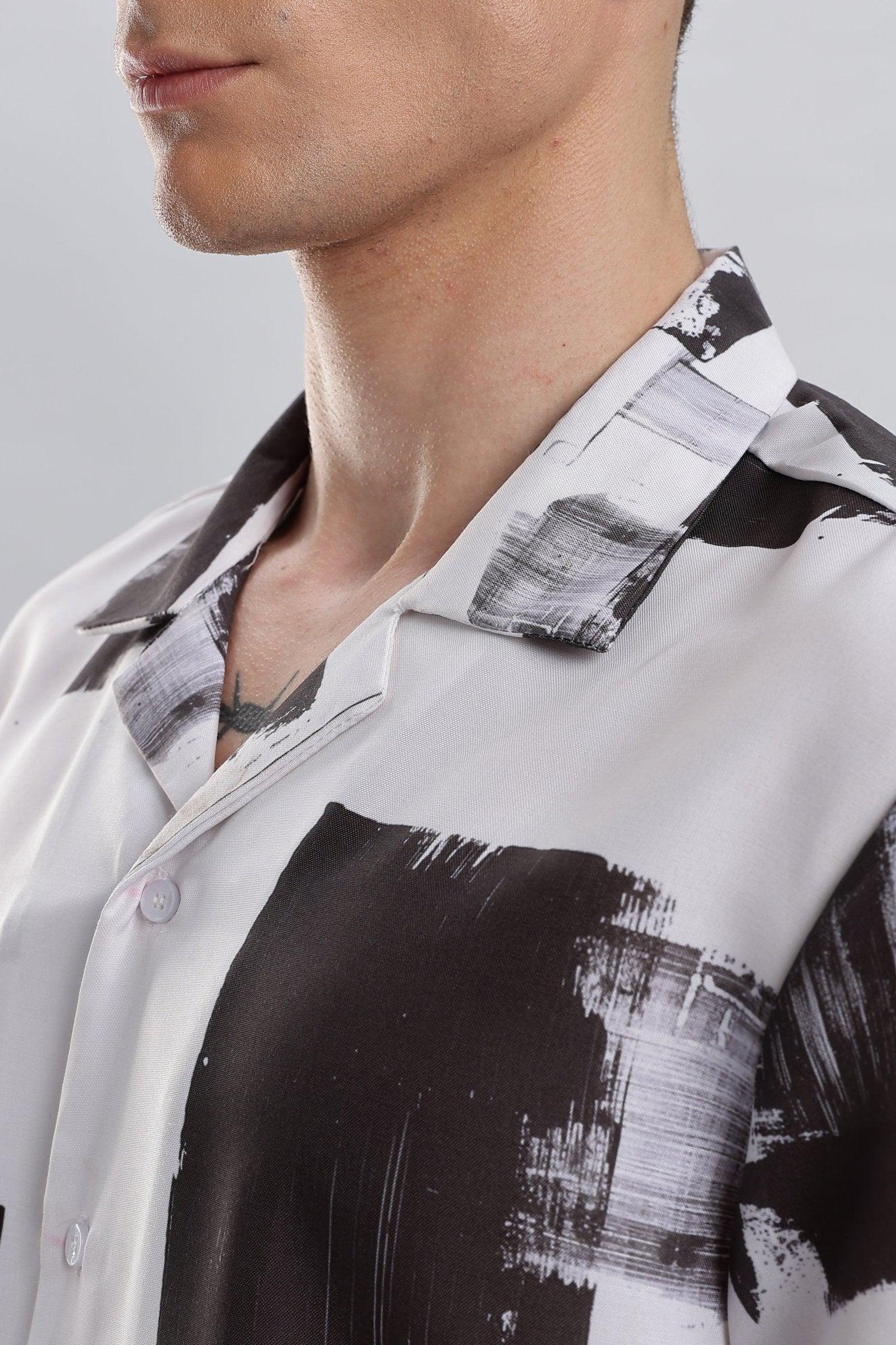 Stylera black and white artsy shirt for men camp collar button front shirt with brushstroke print on model