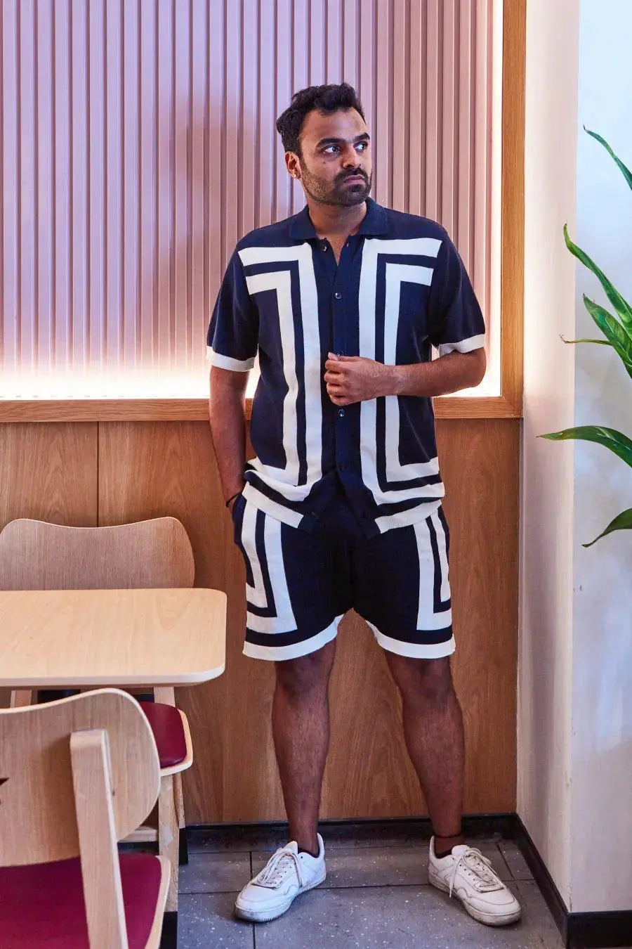 Stylish black and white pattern shorts paired with a coordinating top for a trendy look