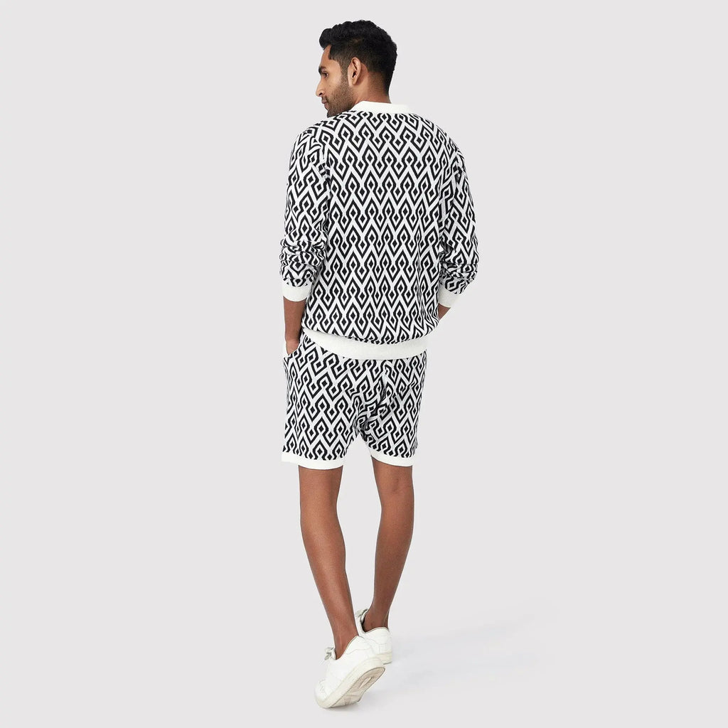 Men's black and white patterned shorts men paired with a matching top for casual comfort