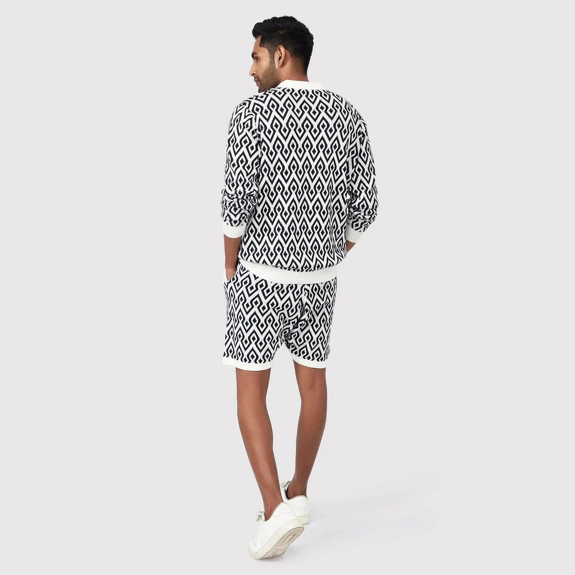 Men's black and white patterned shorts men paired with a matching top for casual comfort