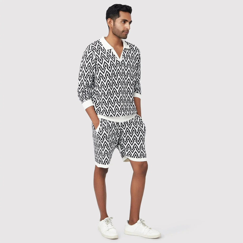 Stylish black and white patterned shorts men paired with a matching top for casual wear