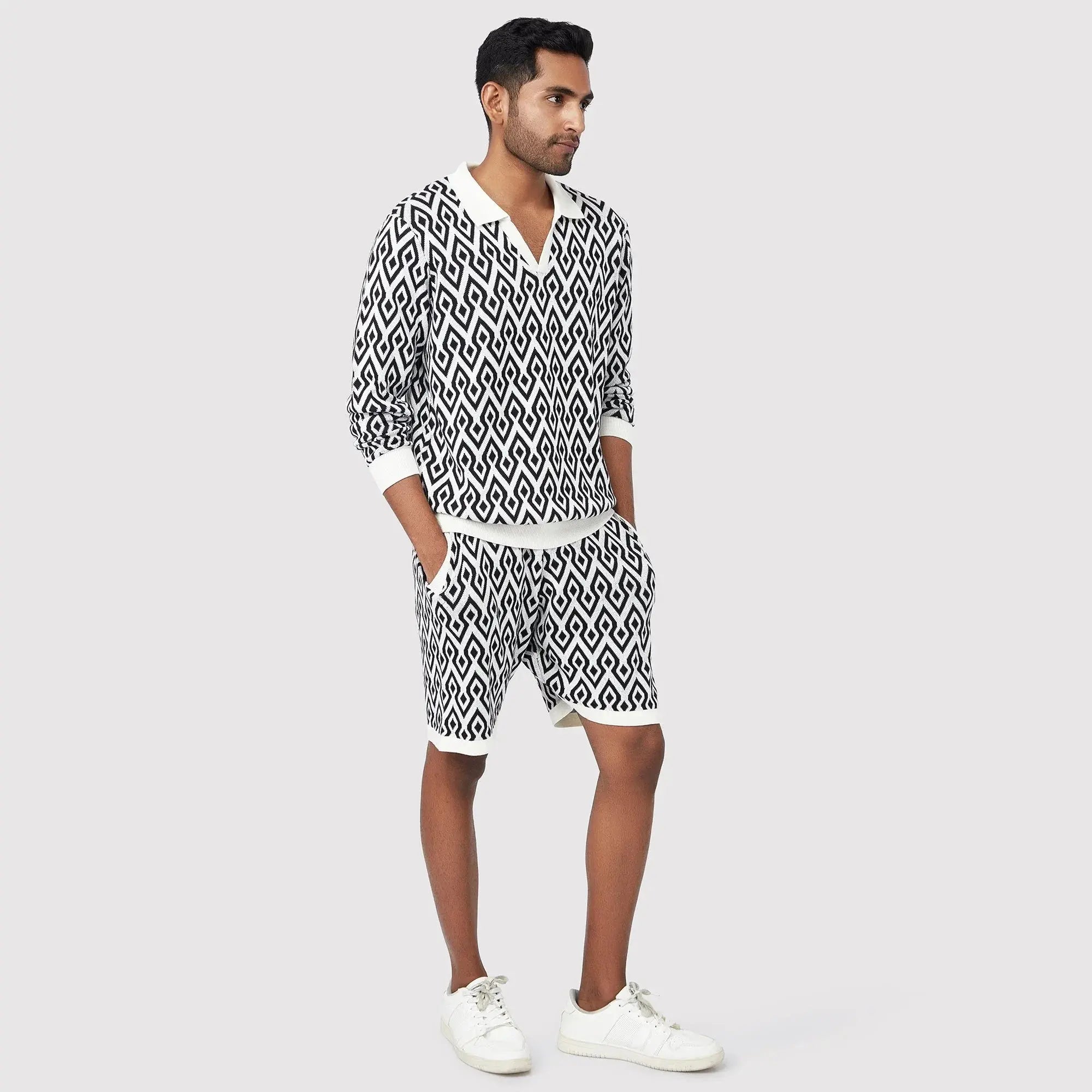 Stylish black and white patterned shorts men paired with a matching top for casual wear