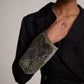Black dress blazer for women by Stylera featuring detailed embroidery on sleeve cuff