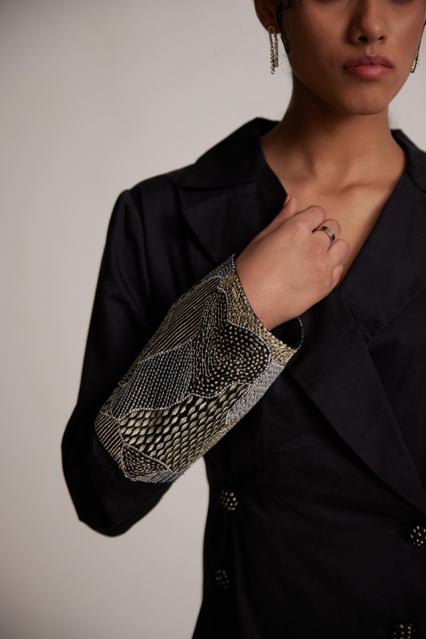 Black dress blazer for women by Stylera featuring detailed embroidery on sleeve cuff